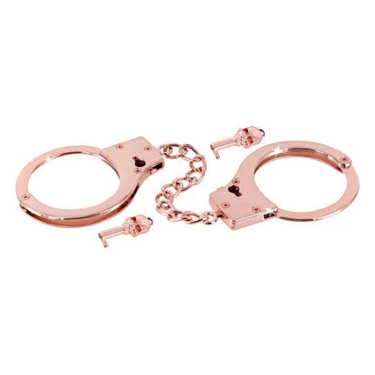 Menottes Or Rose en Métal – FetishTentation | BDSM Sécuritaire & Élégance FetishTentation Sensations plus